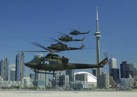 400 Tactical Helicopter Squadron, Canadas oldest Air Force squadron, officially kicked-off its 75th anniversary with a fly-past of the Toronto waterfront recently. The five Griffon Helicopter Formation, commanded by LCol Edward Karpetz, invited several photojournalists on-board as a way to promote the squadron in the local area.

