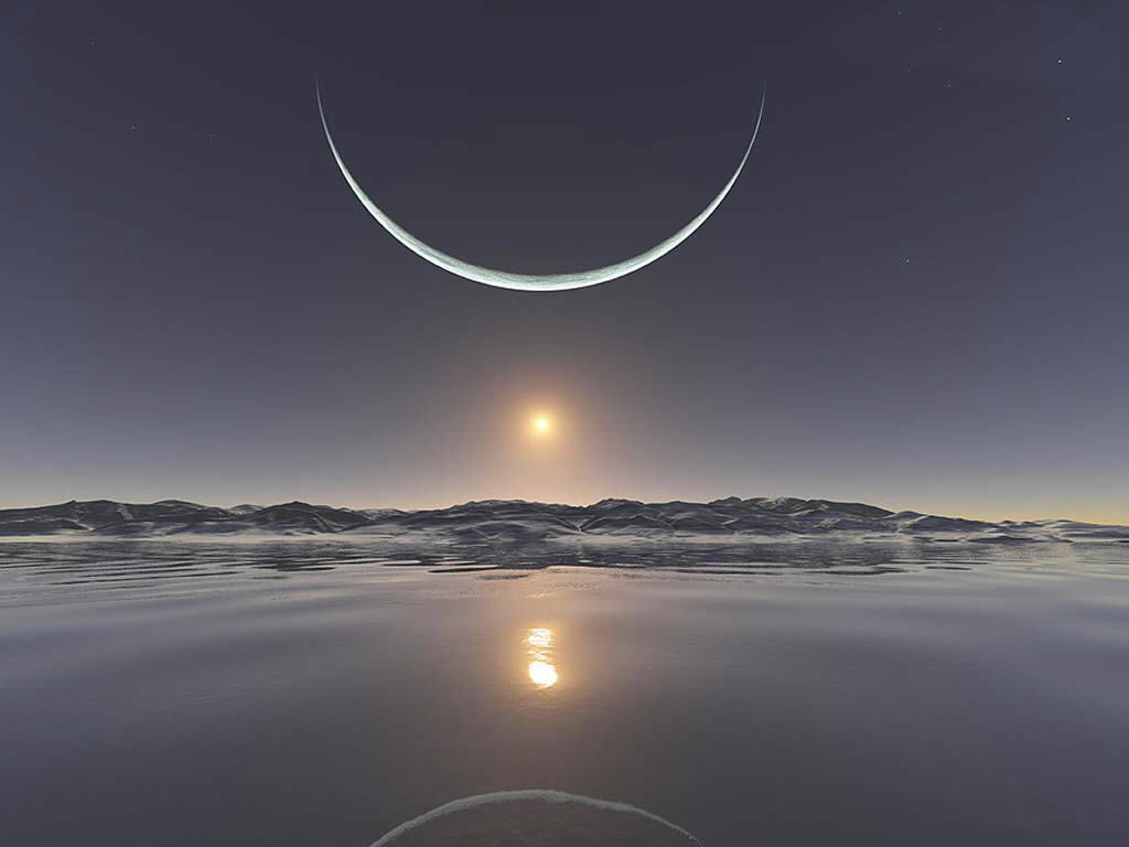  A scene you will probably never get to see, so take a moment and enjoy the scene at the North Pole.
 This is the sunset at the North Pole with the moon at its closest point.
 And, you also see the sun below the moon.

 An amazing photo and not one easily duplicated.