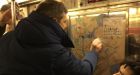New York City commuters team up to clean Nazi graffiti in subway car