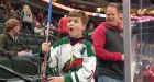 Young hockey fan has priceless reaction after being handed Canucks stick