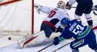 Canucks' power play connects to thump Capitals for 4th straight win