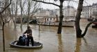 Rain-swollen Seine burst its banks, engulfs quays