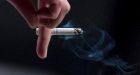 2 tobacco firms' payouts in $15B lawsuit on hold after court rulings