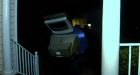 Man wearing TV on his head spotted leaving old TVs on porches