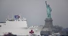 Help at last: Navy hospital ship the USNS Comfort docks in New York harbor