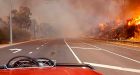 Out-of-control Australia wildfire destroys dozens of homes