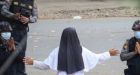 'Shoot me instead': Myanmar nun pleads with junta forces | CTV News