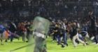 Indonesia: 125 dead after fans stampede to exit soccer match