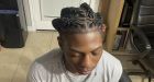 A Black high school student was suspended for his hairstyle. Now, his family is suing Texas officials