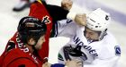 Flames prevail over visiting Canucks