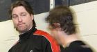 Charest threatens law against fighting in junior hockey
