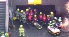 Crews rush to help victim of garage collapse