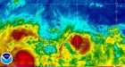 Two tropical storms move across the Pacific