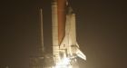 Shuttle Discovery blasts into space