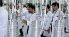 Iran says new centrifuge models improving its nuclear program could be running in 2011