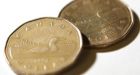 Loonie extends 2009 gains
