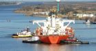 Crews work to protect sensitive wildlife areas after oil spill shuts down major Texas port