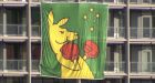 Kangaroo flag at athletes village causes IOC flap