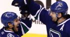 Canucks hammer Flyers