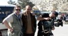 Canadian TV cameraman beaten by mob in Egypt; escapes with army's help