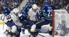 Predators grind out 2OT win over Canucks