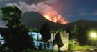 Indonesian volcano erupts, spewing rock and lava
