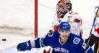 Canucks move into first in West