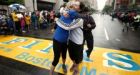 Hugs, cheers as thousands return to run Boston Marathon's final mile