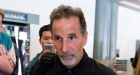 John Tortorella arrives in Vancouver amid reports of coaching hire