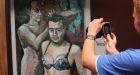 Artist who painted Putin in women's underwear flees Russia
