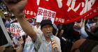 Japan ends military's 60-year ban on fighting abroad
