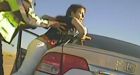 Dashcam footage shows arrest of woman accused of assaulting sheriff