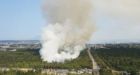 Aircraft join battle against wildfire in wooded, marshy area of Richmond, B.C.