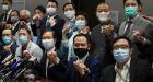 Hong Kong's pro-democracy lawmakers resign en masse