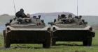 Russia to pull troops back from near Ukraine