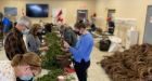 Volunteers work to remake wreaths after thousands stolen ahead of commemoration