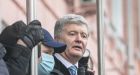 Former Ukrainian president Poroshenko returns to face treason case as Russian war fears escalate