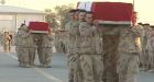 Bodies of two slain soldiers on their way home