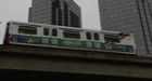 SkyTrain runs between stations with open doors