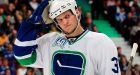 Canucks' Bieksa goes from dead man walking to indispensable