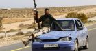 Libyan rebels advance on Gadhafi's hometown