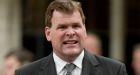 Baird demands gold on new business cards