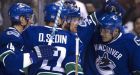 Sedins spark Canucks in win over Predators