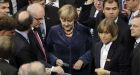 Merkel wins rescue fund vote after raising spectre of war