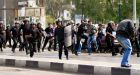 Police, protesters fight for control of Tahrir Square  