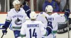 Schneider, Canucks outlast Devils