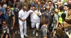 Olympic torch relay: Injured soldier walks with flame