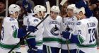 Schneider, Raymond lead Canucks' 5-0 rout of Ducks