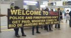 Brazilian police greet tourists with 'Welcome to Hell' sign at Rio airport