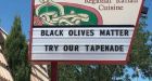 'Black olives matter' restaurant billboard sparks fury